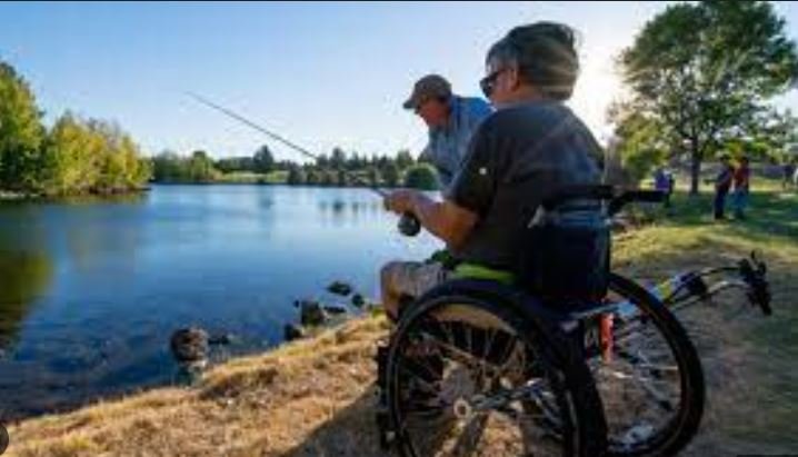 image of a disabled man fishing
