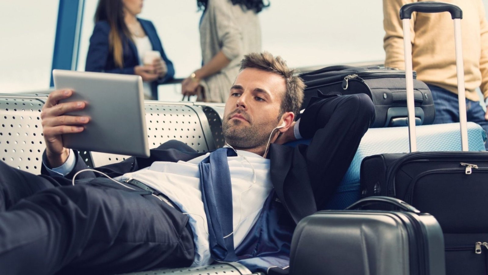 A man Staying Productive While Travelling