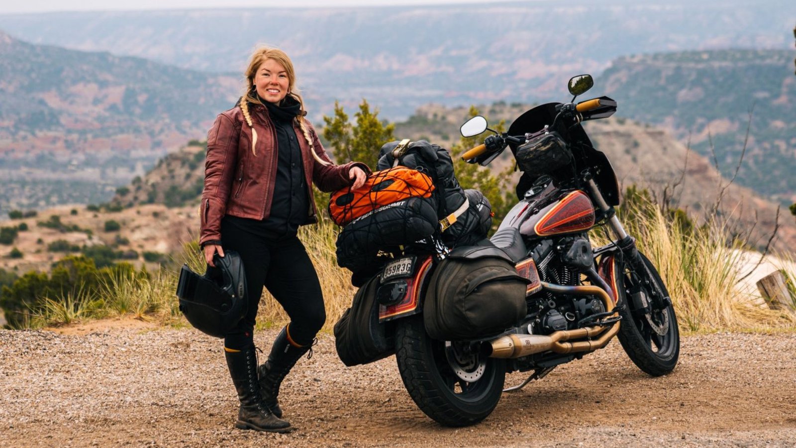 A woman Travelling on a Motorcycle